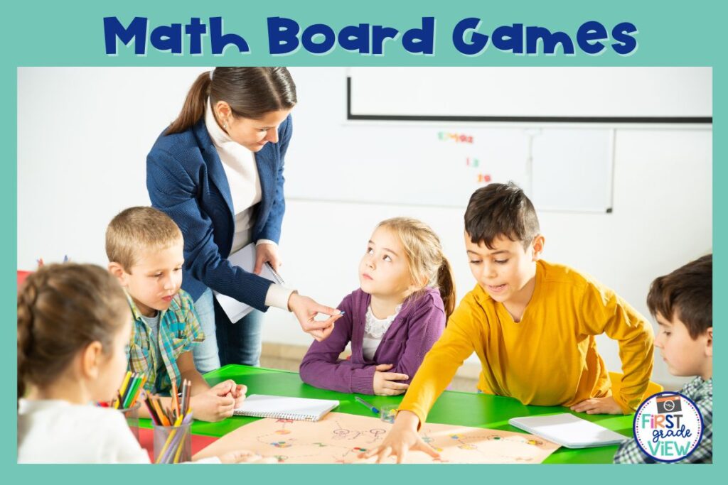 Image of a teacher helping students create a math board game. 